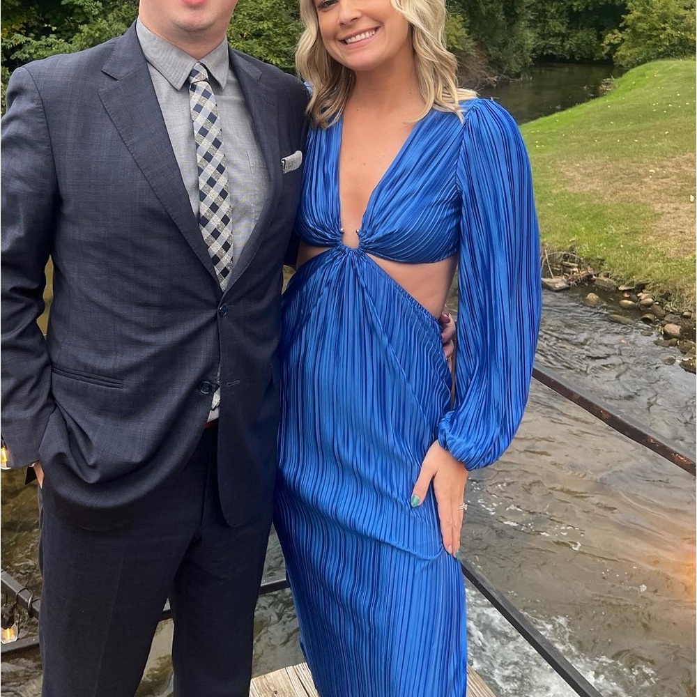 Cobalt blue pleated midi dress with cut outs